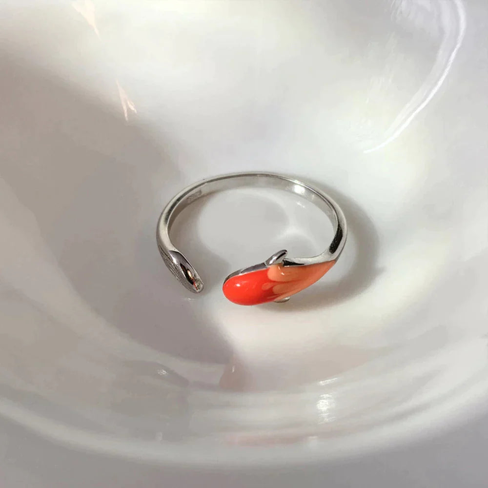 Anneau de chance sur koi rouge