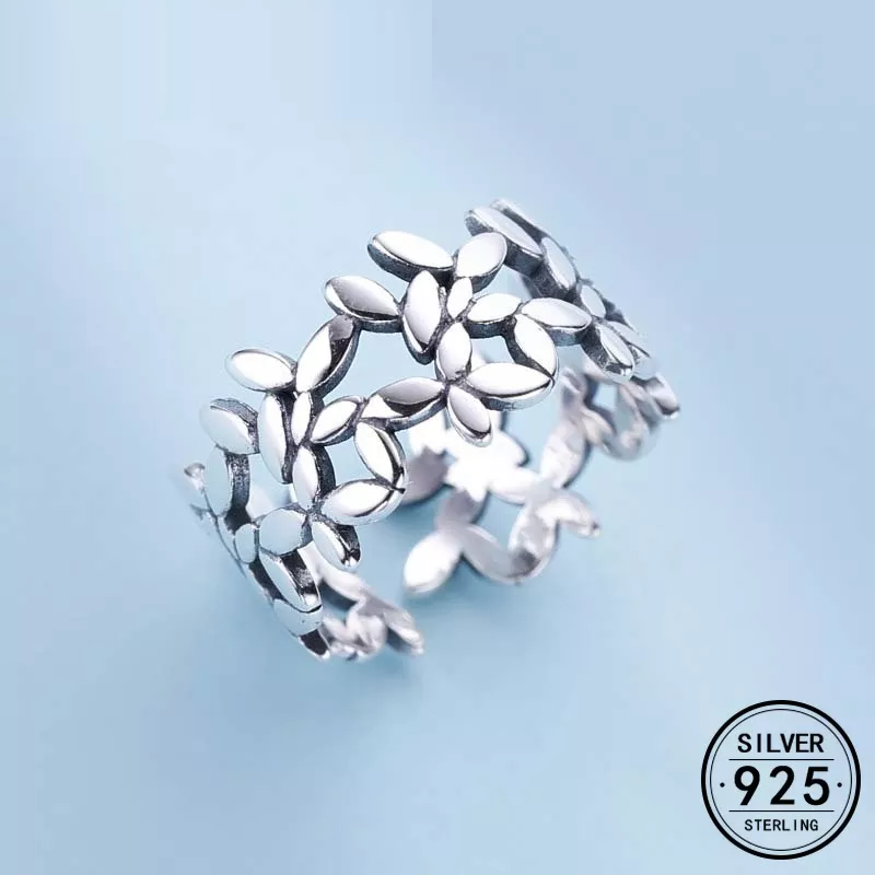Bague en argent ajustable avec motif floral