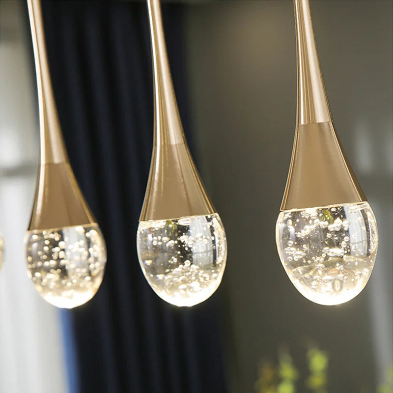 Suspension en verre avec une lumière chaude - Vetra