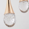 Suspension en verre avec une lumière chaude - Vetra