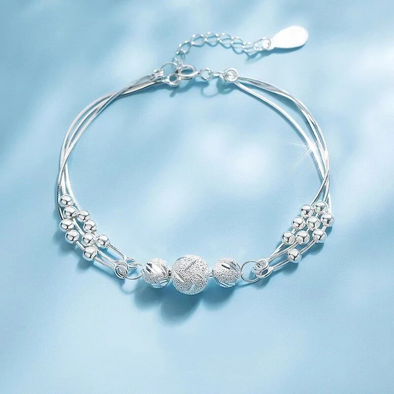 Bracelet en perles argentées