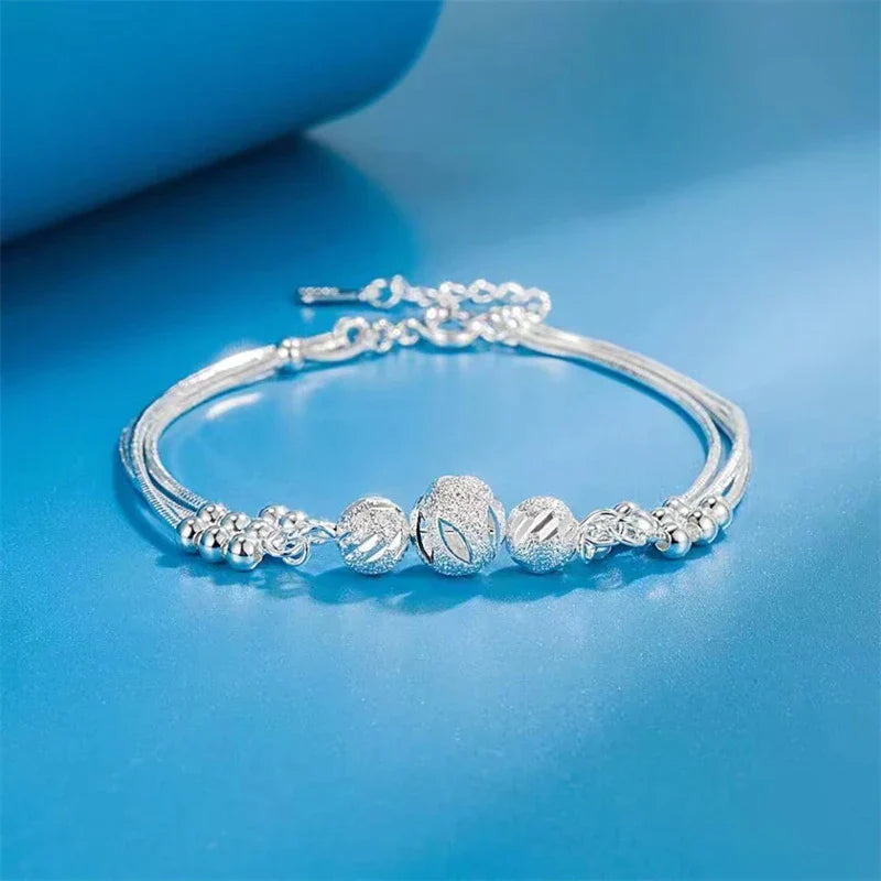 Bracelet en perles argentées