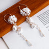 Boucles d'oreilles bohémiennes avec perles et cristaux