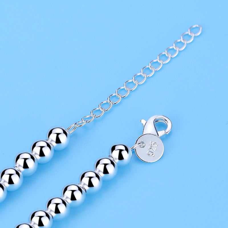 Bracelet en forme de cœur avec perles