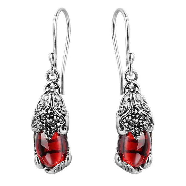 Boucles d'oreilles en argent avec créature mythique – Aelora