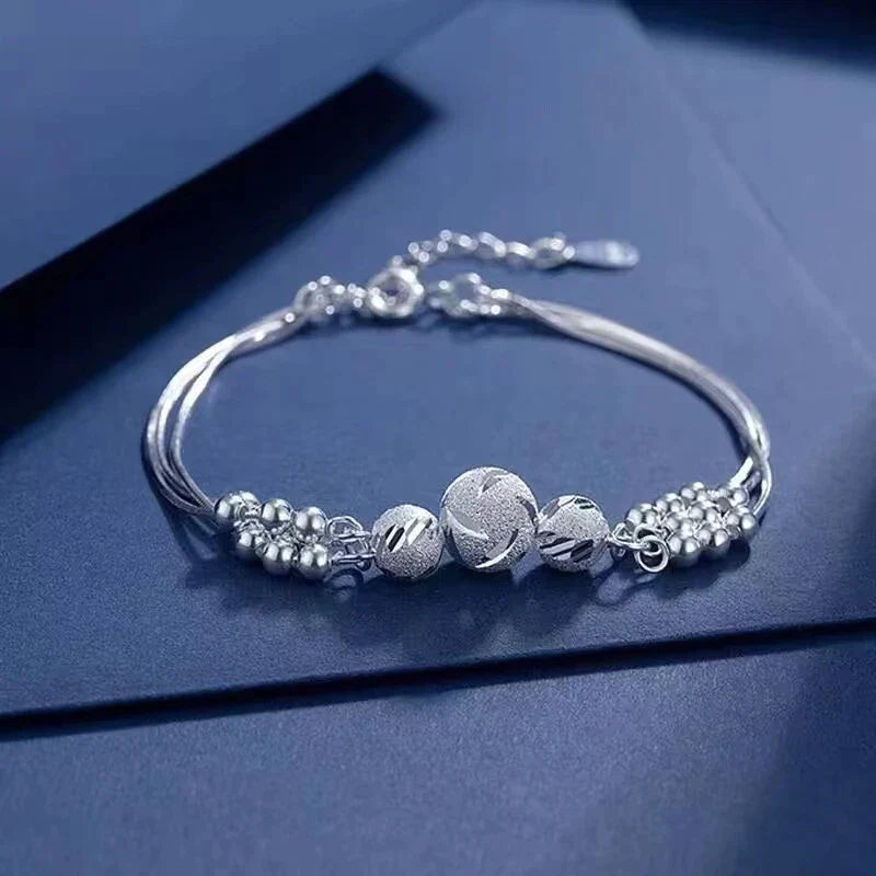 Bracelet en perles argentées