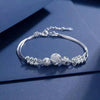 Bracelet en perles argentées