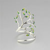 Bague en argent ajustable avec des feuilles vertes