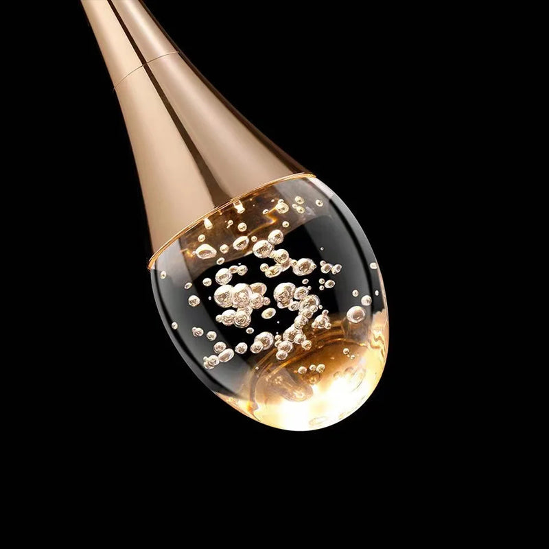 Suspension en verre avec une lumière chaude - Vetra