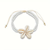 Bracelet de Cheville Bohémien avec Fleur en Coquillage - Accessoire Élégant pour l'Été et les Vacances