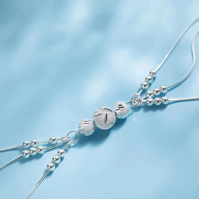 Bracelet en perles argentées