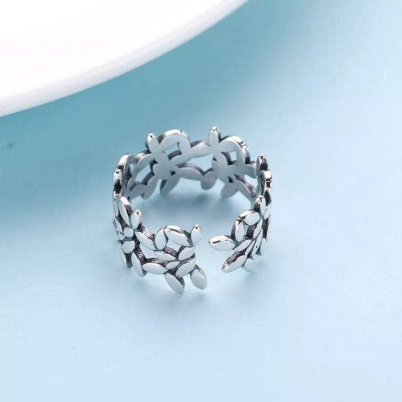 Bague en argent ajustable avec motif floral
