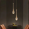 Suspension en verre avec une lumière chaude - Vetra