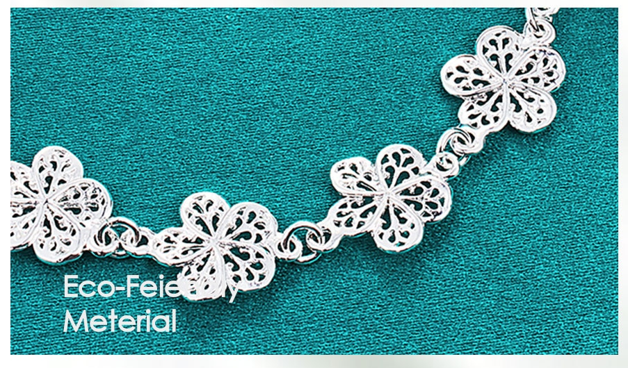 Bracelet en métal argenté en filigrane