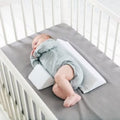 SafeNest – Coussin anti-roulement ajustable en forme de W pour bébés