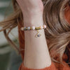 Bracelet en perles avec pendentif œil turc porte-bonheur