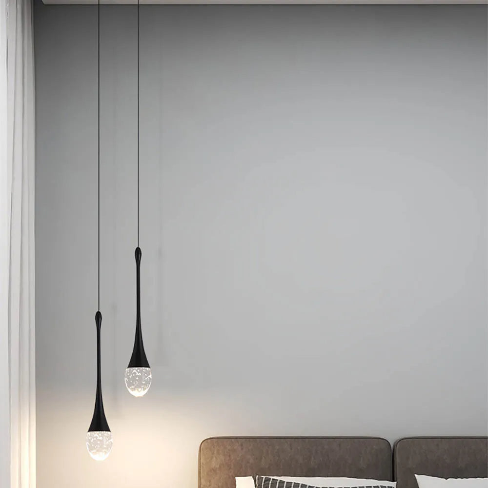 Suspension en verre avec une lumière chaude - Vetra