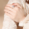 Bague avec cristal rotatif