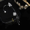 Boucles d'oreilles en forme de papillon scintillantes