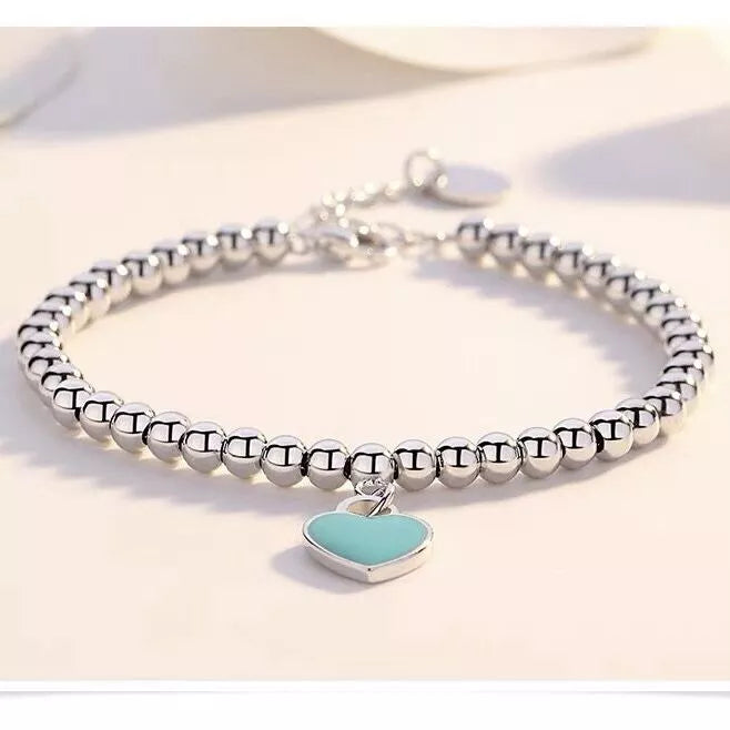Bracelet en forme de cœur avec perles