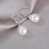 Boucles d'oreilles ovales blanches en perles