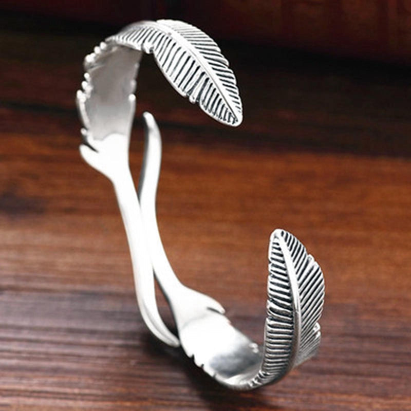 Bracelet ajustable avec plumes argentées