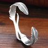 Bracelet ajustable avec plumes argentées