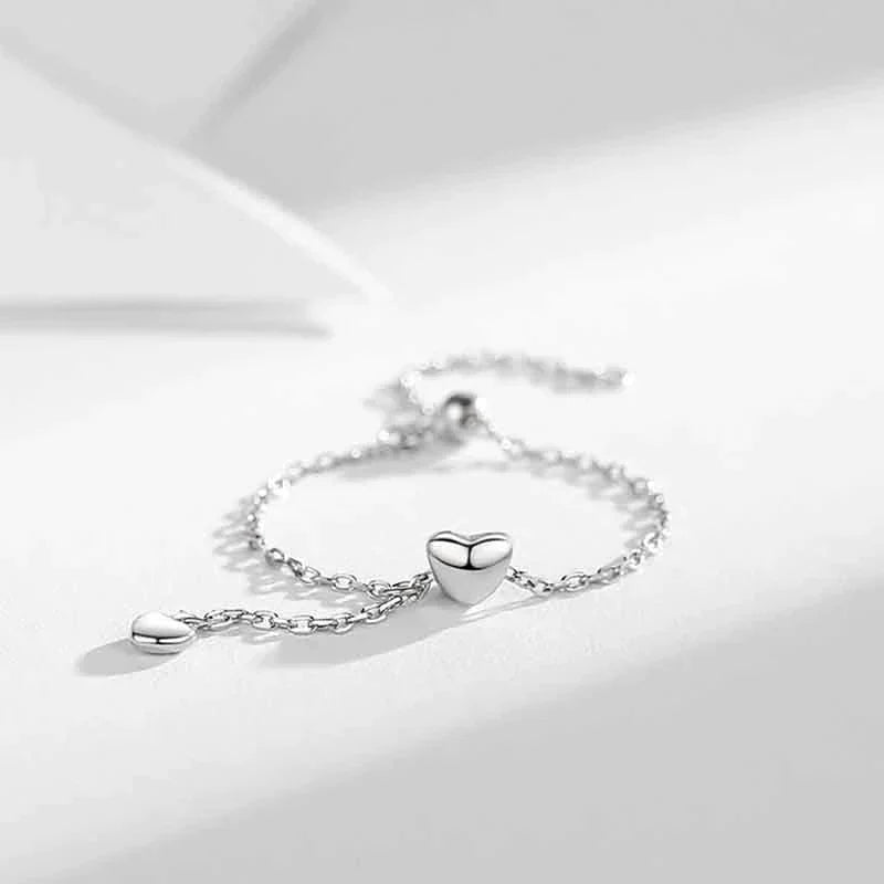 Bague en forme de cœur ajustable avec franges