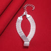 Bracelet porte-bonheur tressé en argent