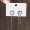 Boucles d'oreilles étoiles à pompons en forme de cœur irrégulier
