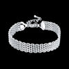 Bracelet porte-bonheur tressé en argent