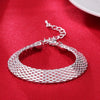 Bracelet porte-bonheur tressé en argent