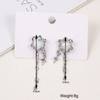 Boucles d'oreilles étoiles à pompons en forme de cœur irrégulier