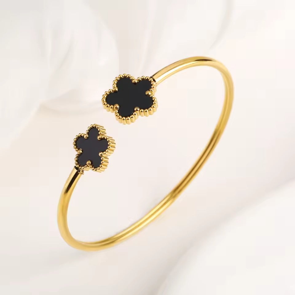 Bracelets clou et trèfle | Or & noir dans un design élégant