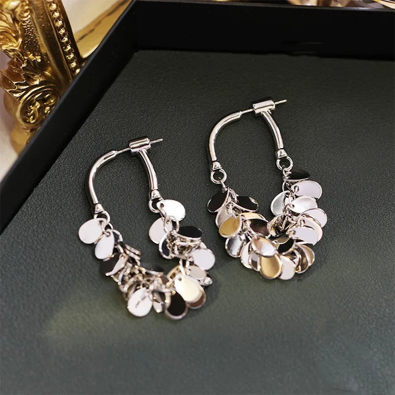 Boucles d'oreilles longues à franges en sequins