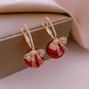 Boucles d'oreilles en perles et en nœuds de Noël