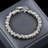Bracelet chaîne perles dorées