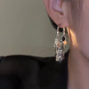 Boucles d'oreilles longues à franges en sequins