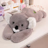 Animal en Peluche à Bras Longs – Doux, Confortable et Polyvalent