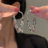 Boucles d'oreilles longues à franges en sequins