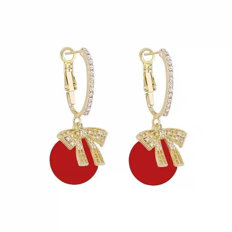 Boucles d'oreilles en perles et en nœuds de Noël
