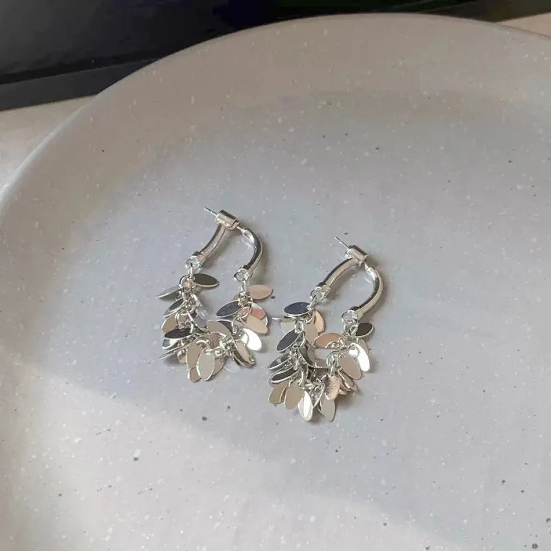 Boucles d'oreilles longues à franges en sequins