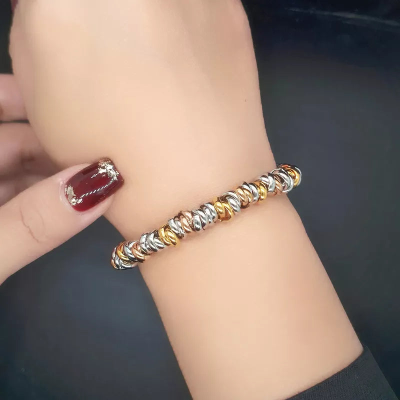 Bracelet chaîne perles dorées