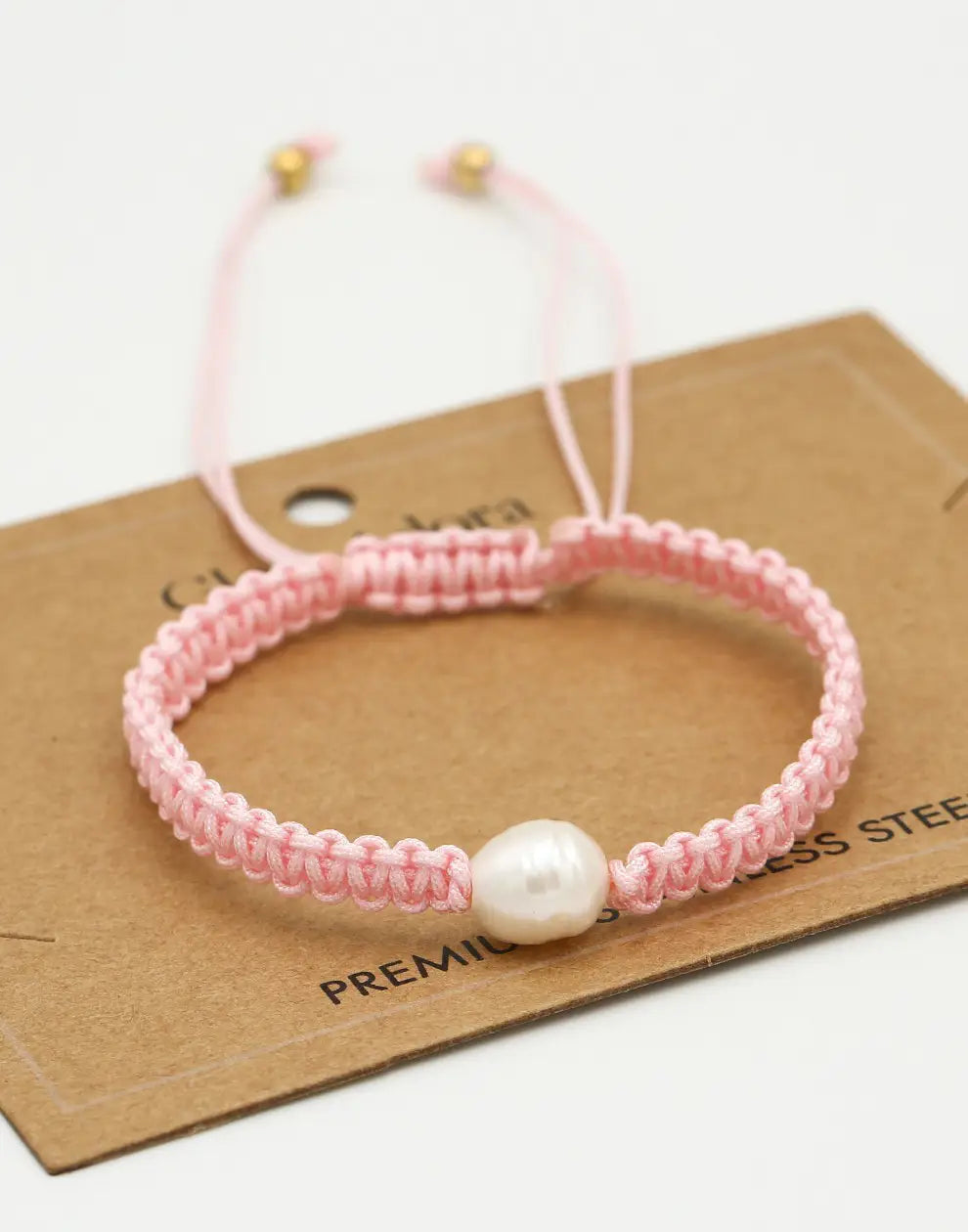 BRACELET EN PERLES ROSES