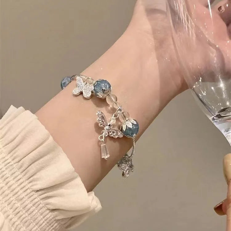 Bracelet en forme de papillon bleu ciel avec motif floral – Violet