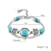 Bracelet avec des papillons et des perles turquoises