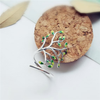 Bague en argent ajustable avec des feuilles vertes
