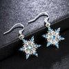 Boucles d'oreilles flocons de neige de Noël