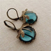 Boucles d'oreilles en goutte de pierre de lune libellule