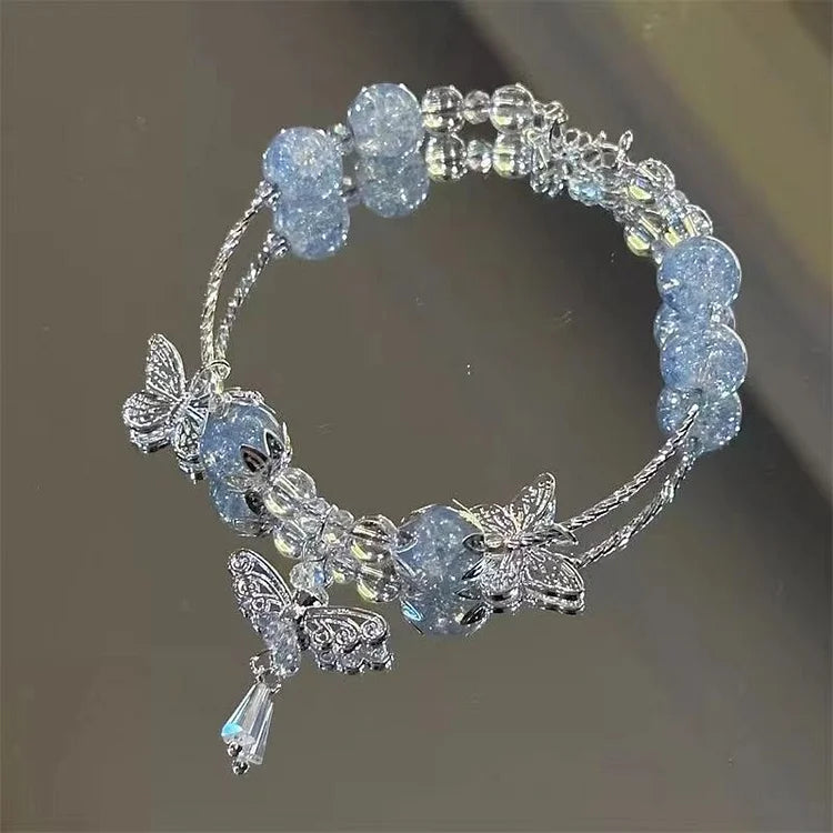 Bracelet en forme de papillon bleu ciel avec motif floral – Violet
